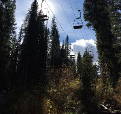 the snowflake chairlift towers above the sawmill reservoir hike, near brecenridge lodging in the four oclock neighborhood